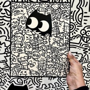 doodle on the wall and small work on canvas panel